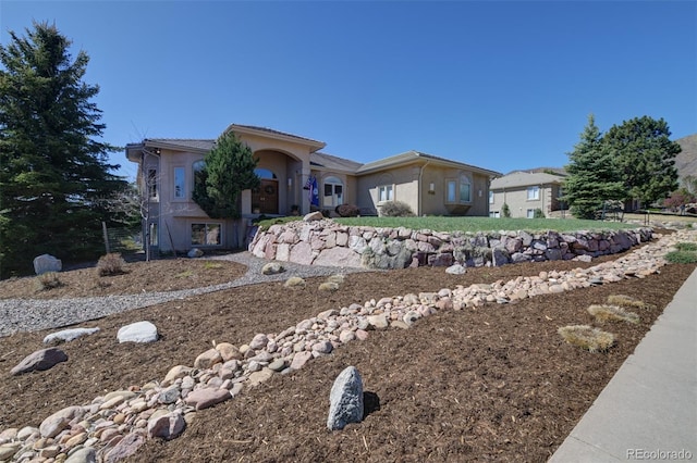 6240 Wilson Rd, Colorado Springs, CO 80919 - view of front of property with stucco siding