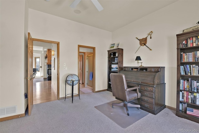 6240 Wilson Rd, Colorado Springs, CO 80919 - carpeted home office with ceiling fan and baseboards