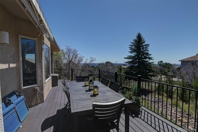 6240 Wilson Rd, Colorado Springs, CO 80919 - wooden terrace featuring outdoor dining area
