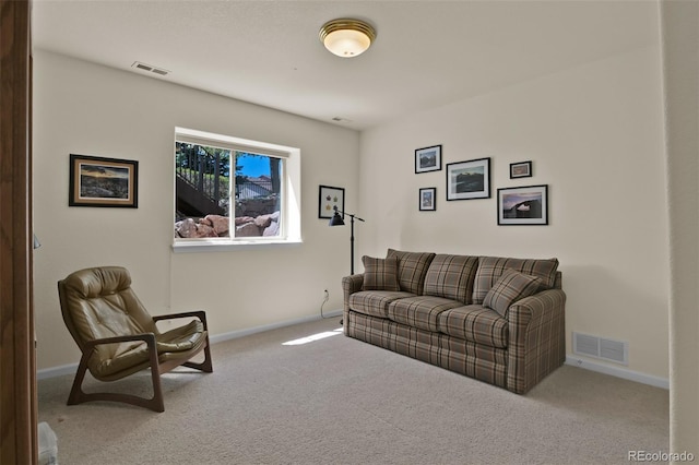 6240 Wilson Rd, Colorado Springs, CO 80919 - carpeted living room with baseboards