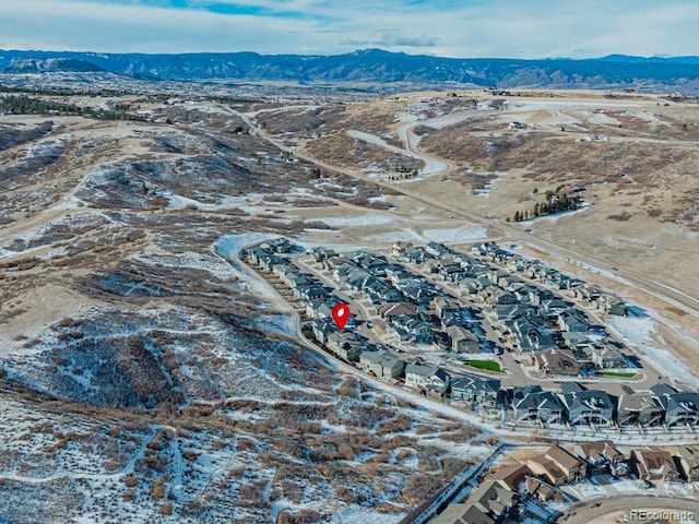 drone / aerial view featuring a mountain view