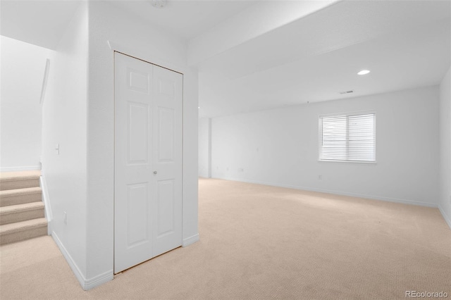 6658 S Shawnee Ct, Aurora, CO 80016 - empty room with light colored carpet, recessed lighting, and stairway
