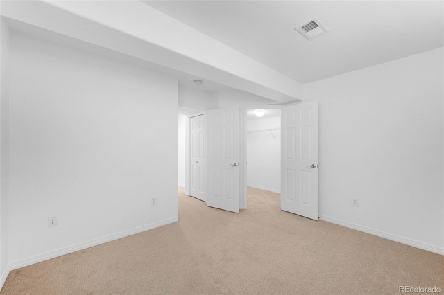 6658 S Shawnee Ct, Aurora, CO 80016 - below grade area with light colored carpet and baseboards