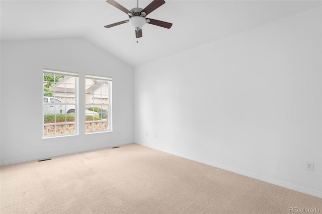 6658 S Shawnee Ct, Aurora, CO 80016 - unfurnished room with light carpet, vaulted ceiling, and a ceiling fan