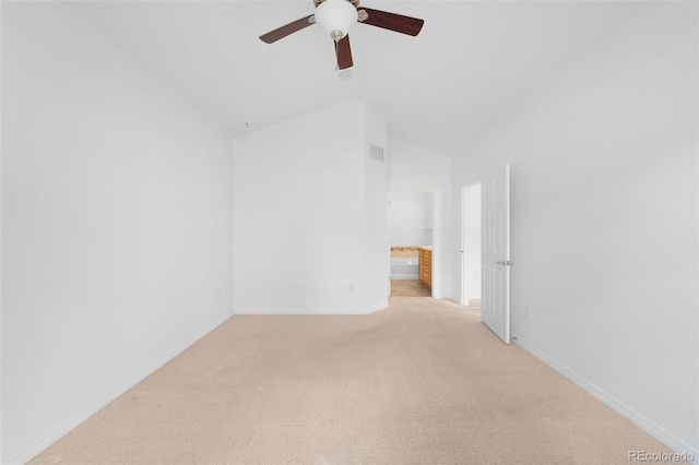 6658 S Shawnee Ct, Aurora, CO 80016 - spare room with light colored carpet, lofted ceiling, and ceiling fan
