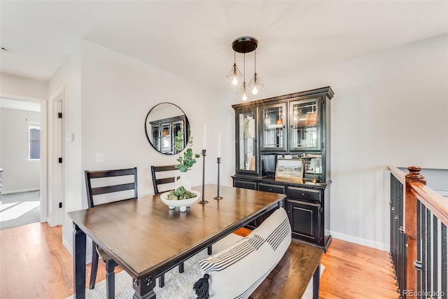 dining room featuring wood-type flooring