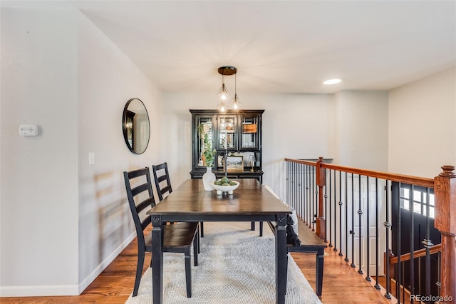 dining space featuring hardwood / wood-style flooring