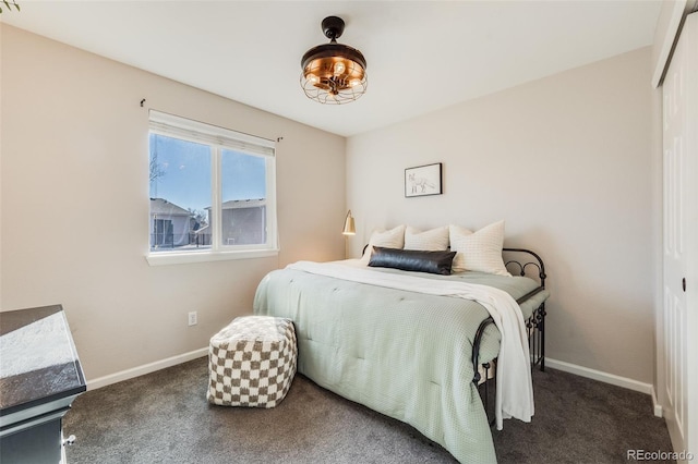 carpeted bedroom featuring a closet