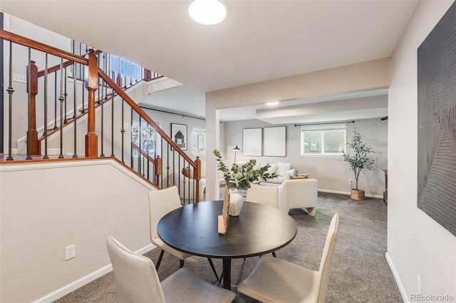 view of carpeted dining area