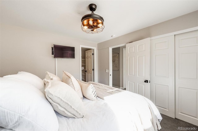 carpeted bedroom with a closet