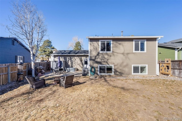 back of house with a patio area