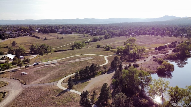 aerial view with a mountain view and a rural view