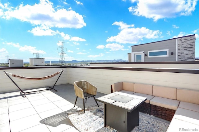 11205 W 53rd Ln, Arvada, CO 80002 - balcony featuring an outdoor living space with a fire pit and a patio