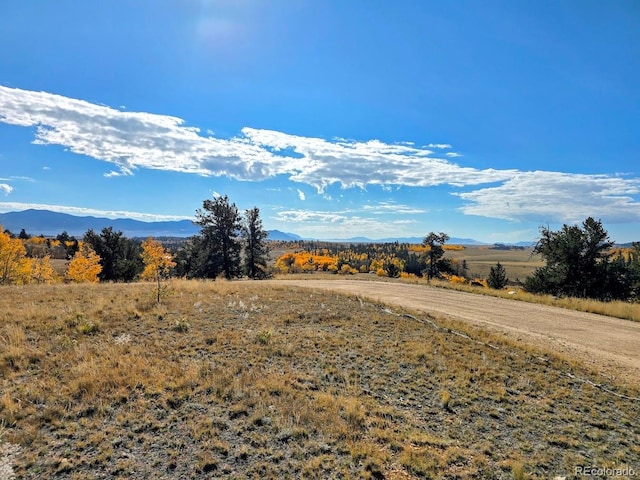 view of mountain feature featuring a rural view