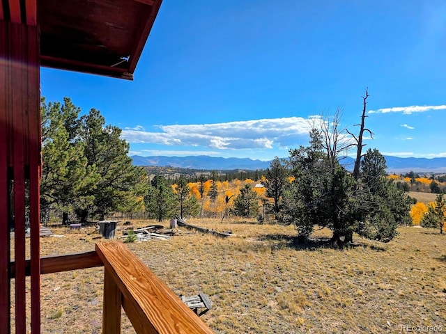 property view of mountains featuring a rural view