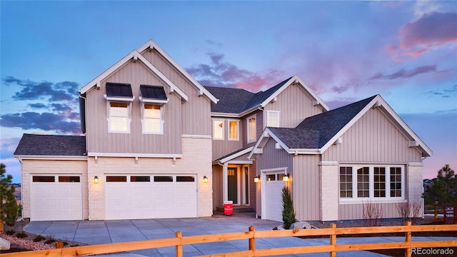 view of front of property with a garage