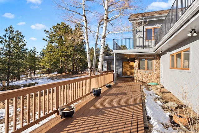 view of snow covered deck