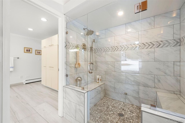 full bathroom with crown molding, recessed lighting, baseboard heating, tiled shower, and baseboards