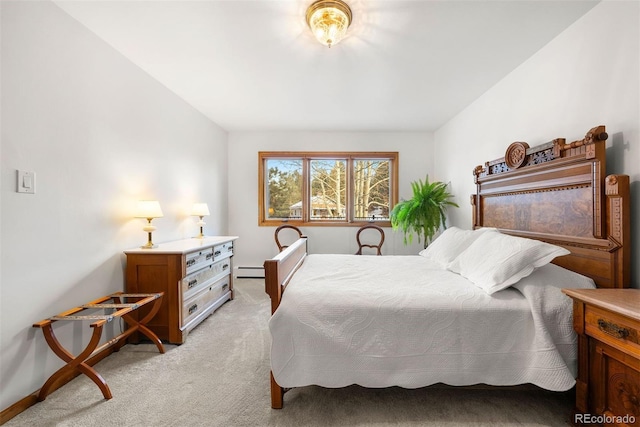 bedroom with baseboards, light carpet, and baseboard heating