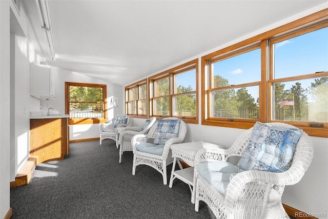 sunroom / solarium with lofted ceiling