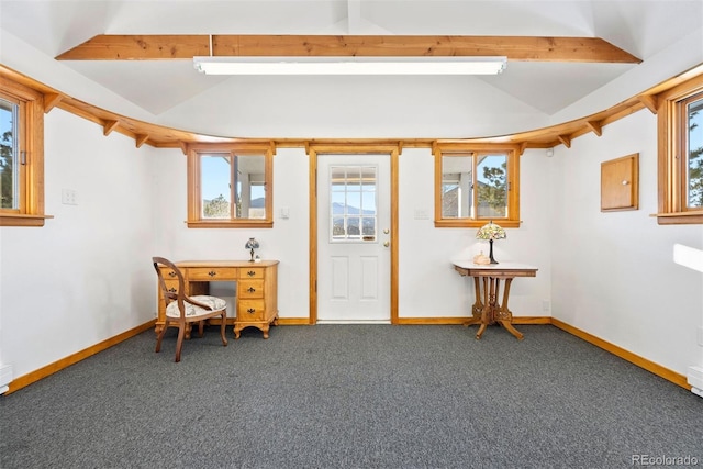 carpeted entryway featuring plenty of natural light, lofted ceiling with beams, and baseboards