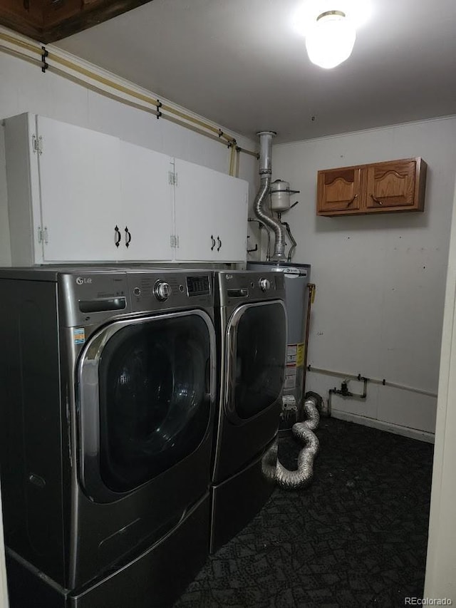 938 Salem St, Aurora, CO 80011 - washroom featuring cabinet space, gas water heater, carpet, and washing machine and dryer
