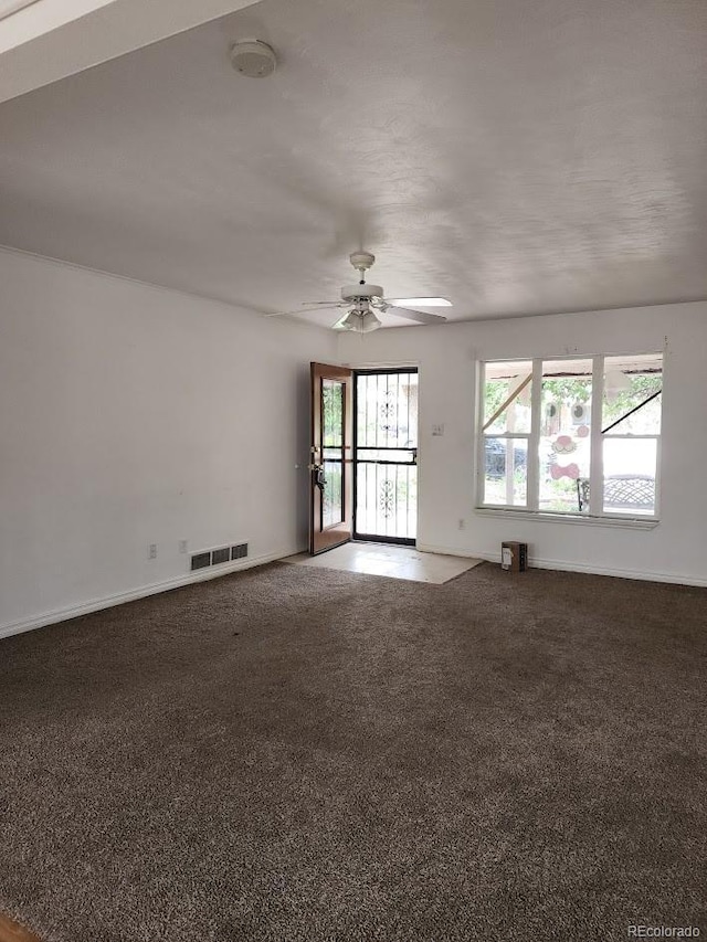 938 Salem St, Aurora, CO 80011 - carpeted spare room featuring a smoke detector and ceiling fan