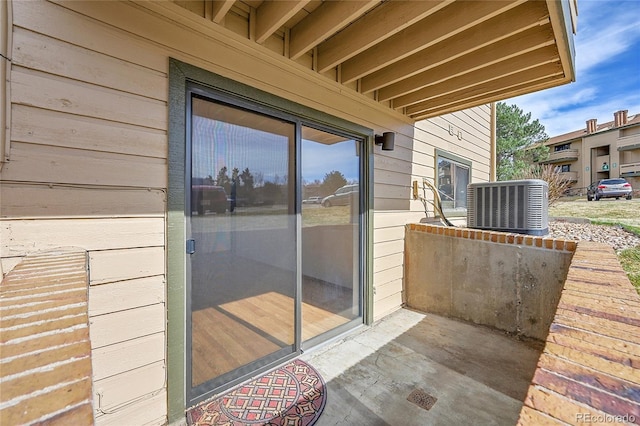 420 Zang St Unit 108, Lakewood, CO 80228 - view of exterior entry featuring central air condition unit