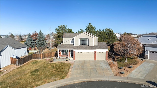 view of front property with a front lawn and a garage