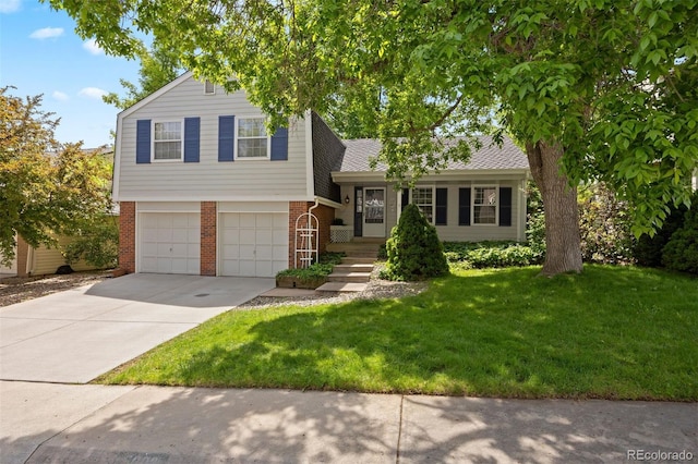 5808 E Hinsdale Pl, Centennial, CO 80112 - split level home featuring brick siding, an attached garage, concrete driveway, and a front yard