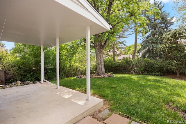 5808 E Hinsdale Pl, Centennial, CO 80112 - view of grassy yard featuring a patio
