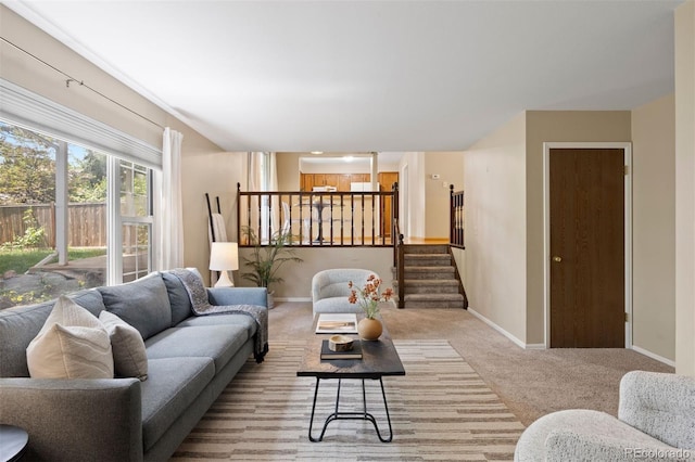 5808 E Hinsdale Pl, Centennial, CO 80112 - carpeted living room with baseboards and stairs