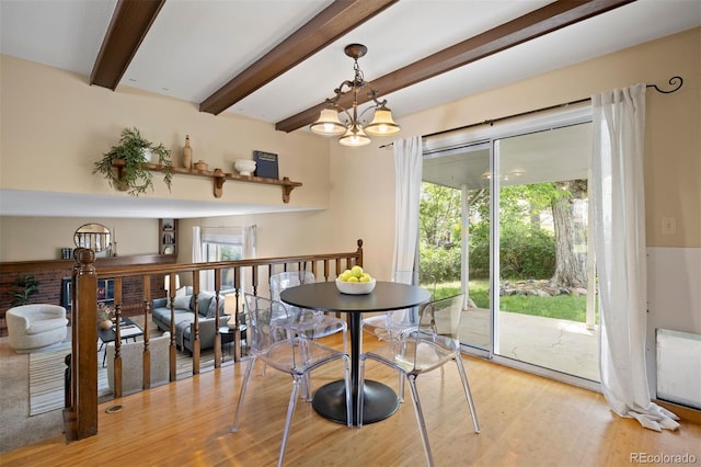 5808 E Hinsdale Pl, Centennial, CO 80112 - dining room featuring a chandelier, light wood-style flooring, and beam ceiling