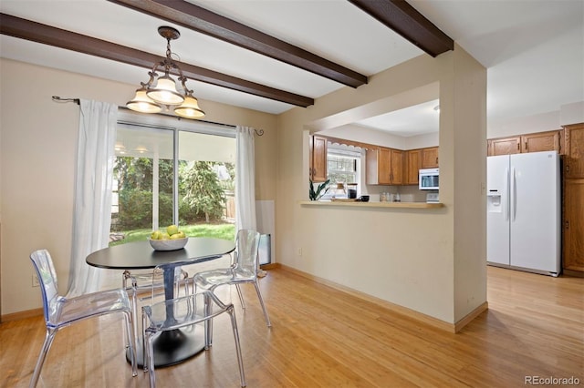 5808 E Hinsdale Pl, Centennial, CO 80112 - dining room with light wood-type flooring, beamed ceiling, and baseboards