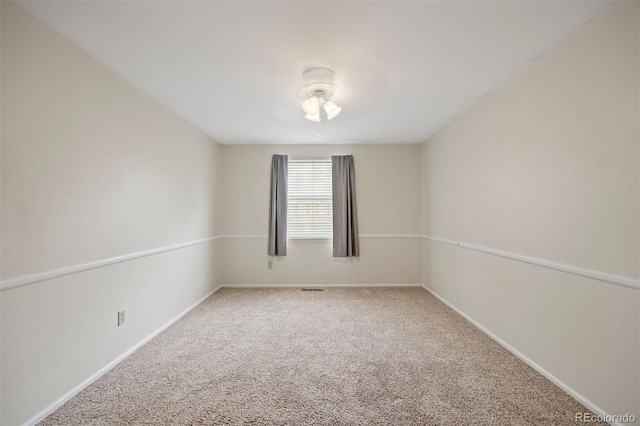 5808 E Hinsdale Pl, Centennial, CO 80112 - spare room featuring carpet floors and baseboards