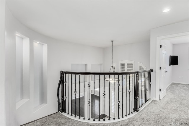 hallway featuring carpet floors