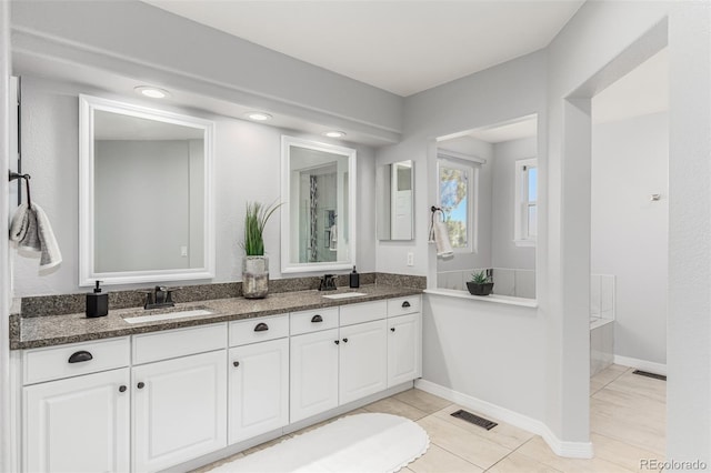 bathroom featuring vanity and tile patterned floors