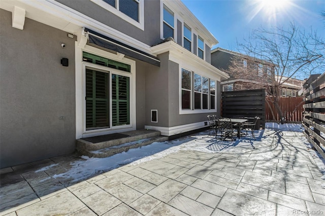 view of snow covered patio