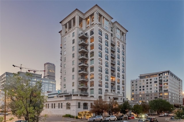 view of outdoor building at dusk