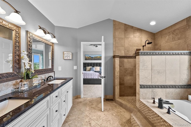 603 E 2nd Ave, Castle Rock, CO 80108 - full bathroom featuring double vanity, connected bathroom, a walk in shower, a bath, and lofted ceiling