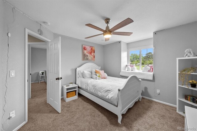 603 E 2nd Ave, Castle Rock, CO 80108 - bedroom featuring carpet floors and ceiling fan