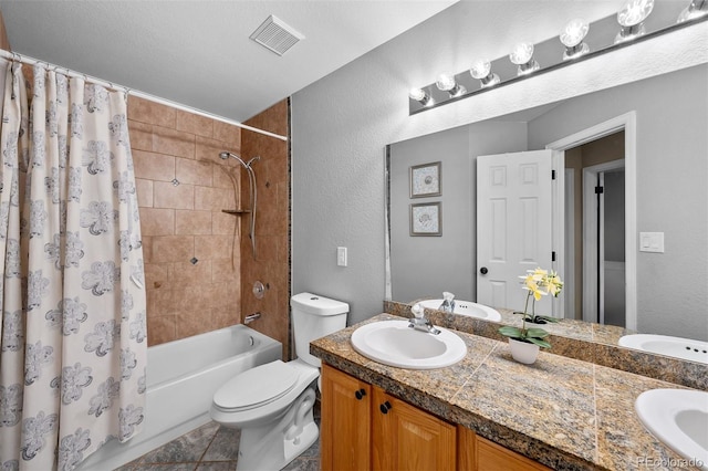 603 E 2nd Ave, Castle Rock, CO 80108 - full bath featuring double vanity, shower / tub combo, a textured wall, and tile patterned flooring