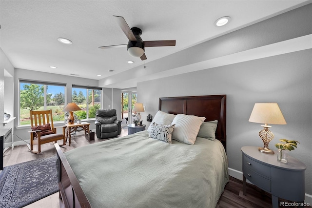 603 E 2nd Ave, Castle Rock, CO 80108 - bedroom with wood finished floors, recessed lighting, and ceiling fan
