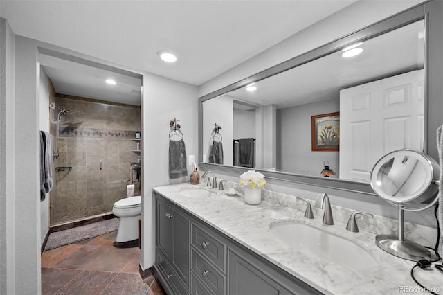 603 E 2nd Ave, Castle Rock, CO 80108 - full bathroom with recessed lighting, double vanity, a stall shower, and stone finish floors