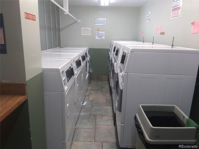 laundry room with separate washer and dryer