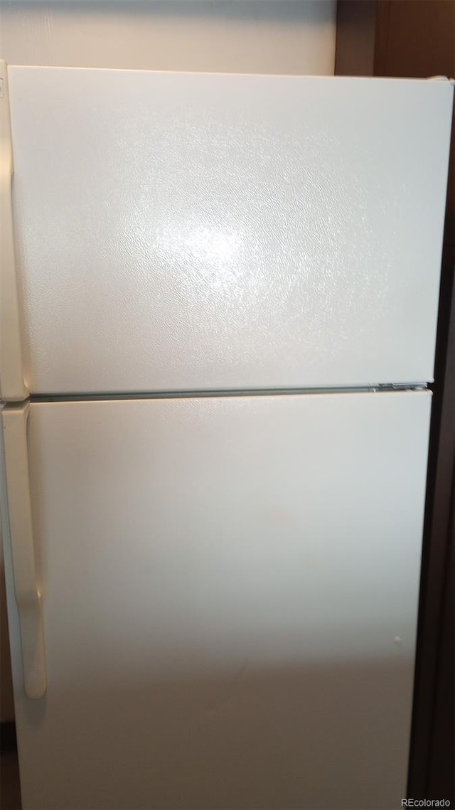 interior details with stainless steel refrigerator