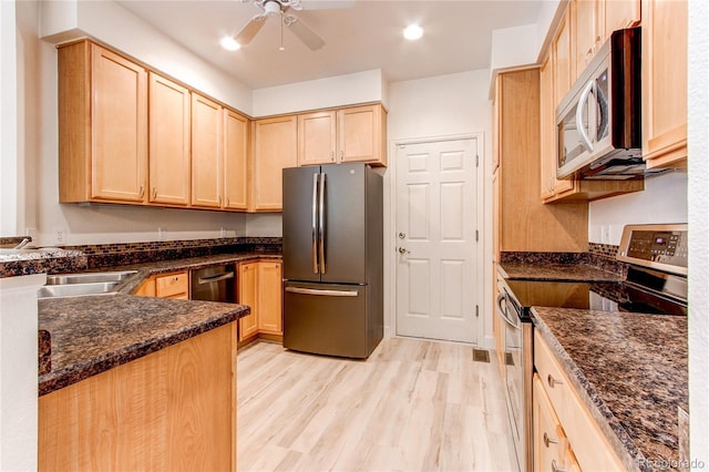 kitchen featuring a ceiling fan, light brown cabinetry, recessed lighting, appliances with stainless steel finishes, and light wood finished floors