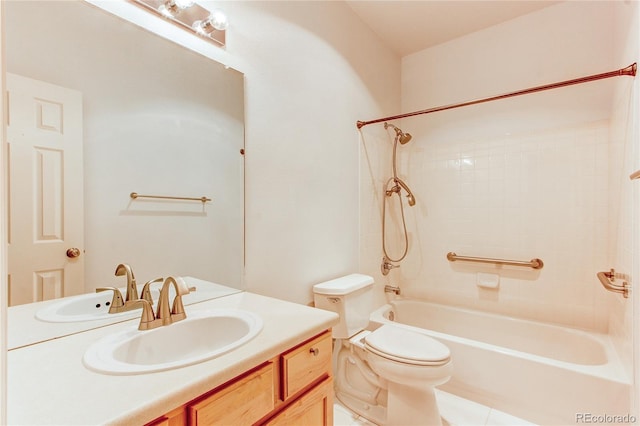 bathroom with toilet, vanity, and washtub / shower combination