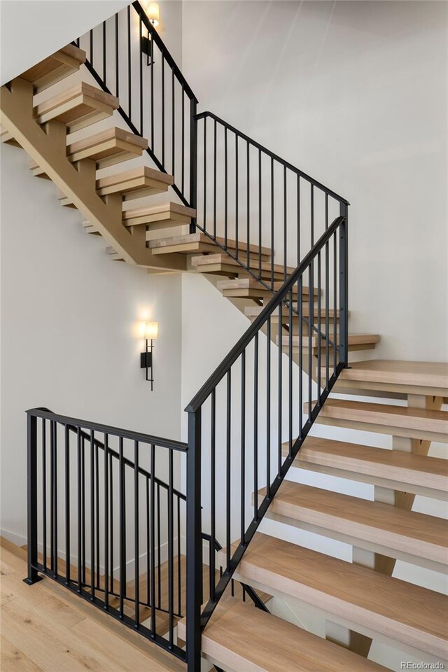 1195 S Milwaukee St, Denver, CO 80210 - stairs with wood finished floors