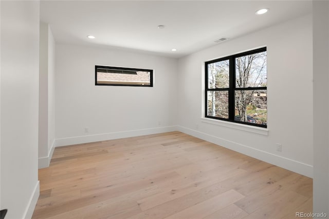 1195 S Milwaukee St, Denver, CO 80210 - spare room with recessed lighting, light wood-style flooring, and baseboards